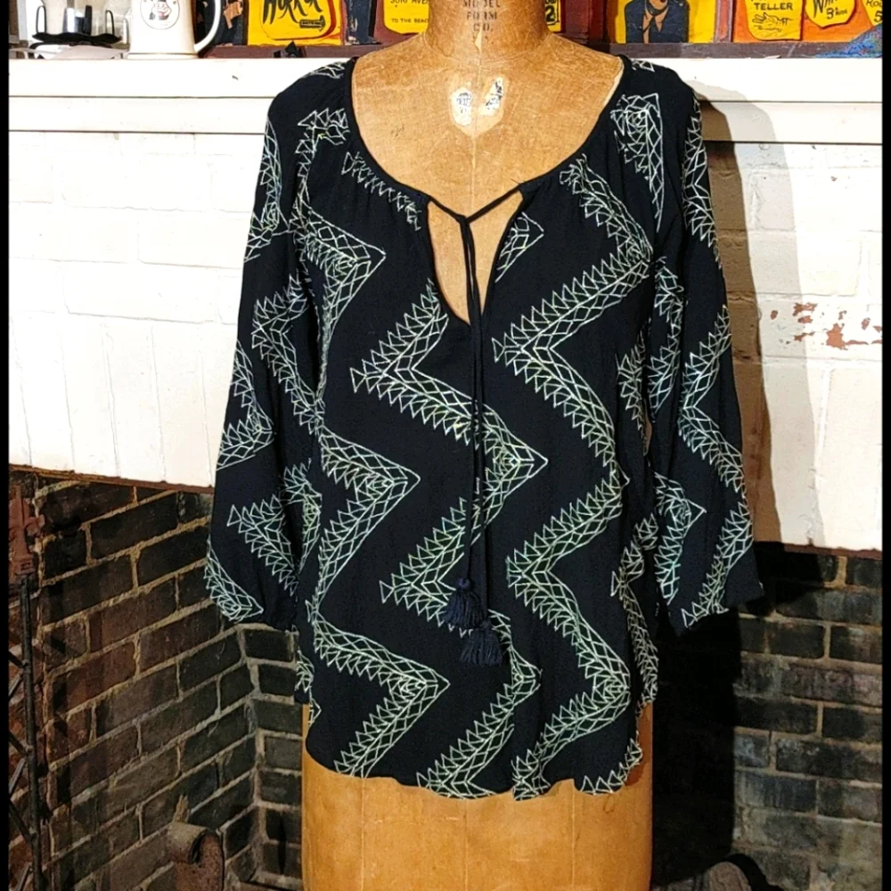 Lovestitch top- love tassels? I do